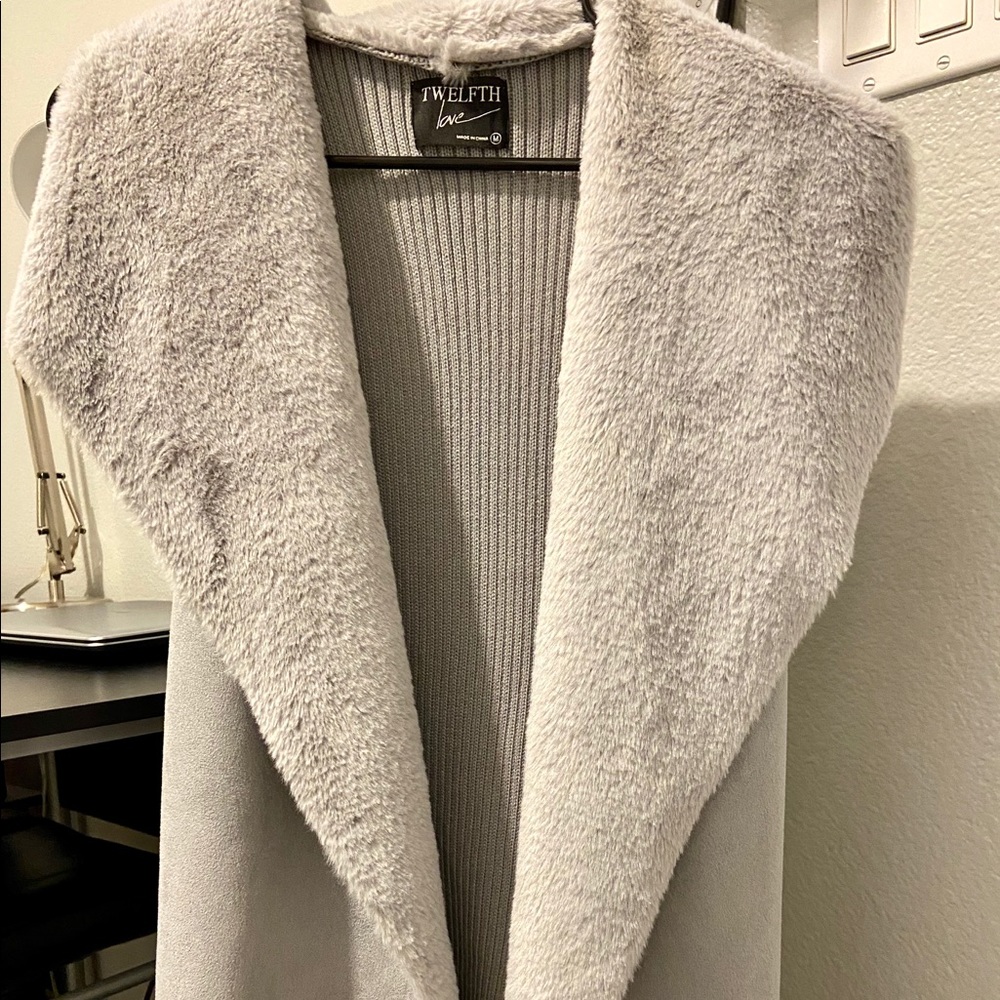 Sold!!!! Grey sleeveless fur lined vest